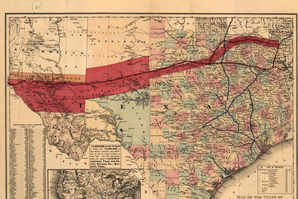 A hand colored map of Texas crossed from east to west by a broad red band marking the reserved railway lands, with a boxed notice advertising land to settlers and an inset map of the United States.